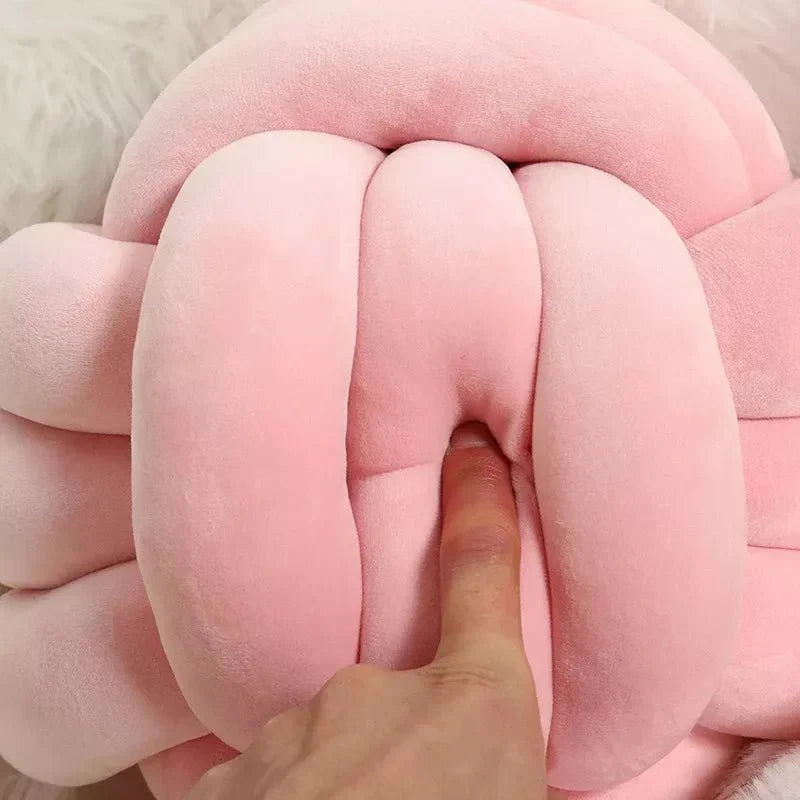 Coussin décoratif et doux avec boule nouée en effet daim