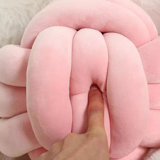 Coussin décoratif et doux avec boule nouée en effet daim