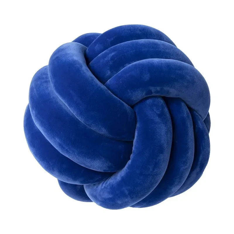 Coussin décoratif et doux avec boule nouée en effet daim