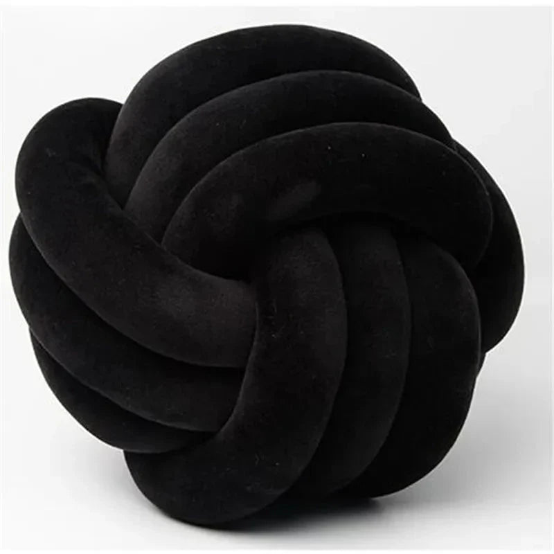 Coussin décoratif et doux avec boule nouée en effet daim