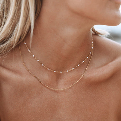 Amara Double Perles Choker - Élégant et Unique !