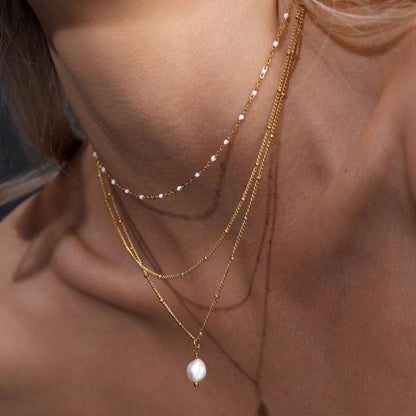 Amara Double Perles Choker - Élégant et Unique !