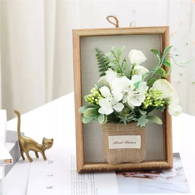 Fleurs avec cadre en bois