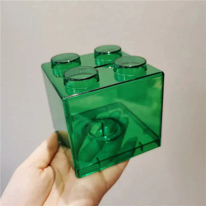 Tirelire translucide en blocs